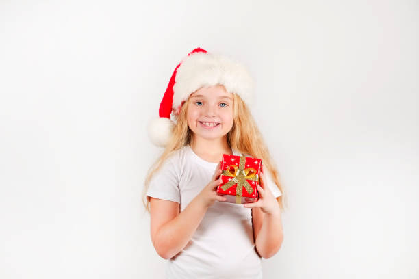istock Cute nine year old girl celebrating christmas. 1077962762