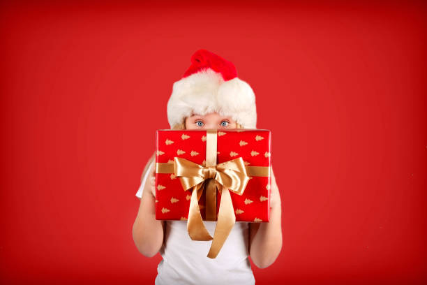 istock Cute nine year old girl celebrating christmas. 1077962772