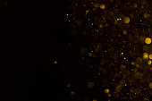Golden glitter falling sparkle background