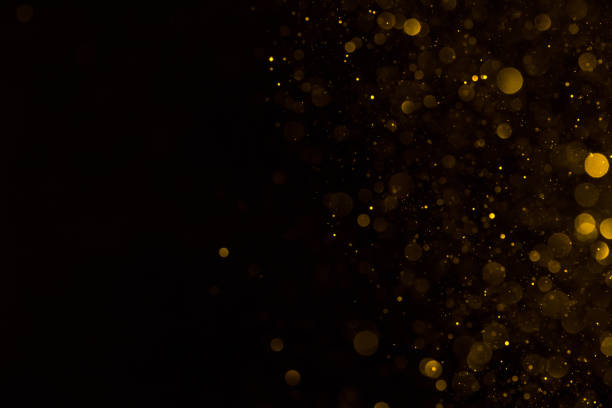 złoty brokat spadający blask tła - gold confetti star shape nobody zdjęcia i obrazy z banku zdjęć