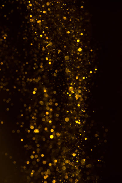 istock Yellow glitter shiny abstract lights 1077965258