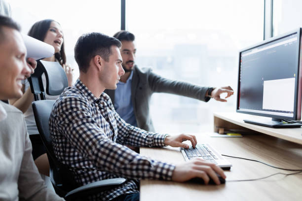 istock Picture of businesspeople working on computer together 1077965976