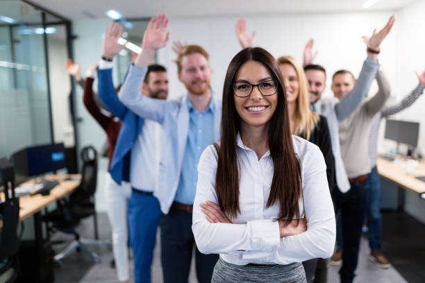 istock Group picture of business team posing in office 1077966032