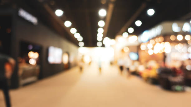 istock Abstract background blurred many people in the exhibition event. 1077969284