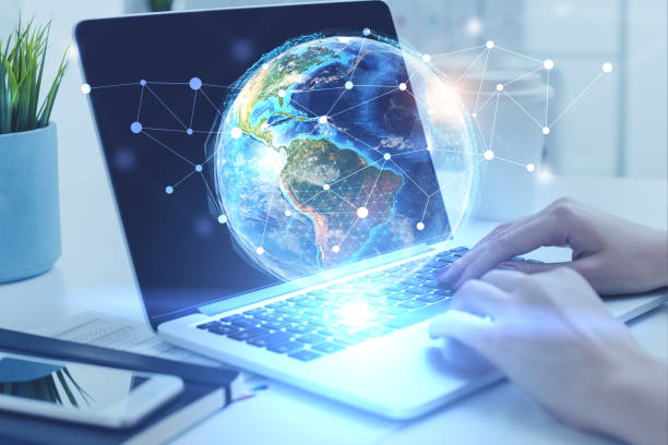istock Woman hands on laptop, global network 1077970868