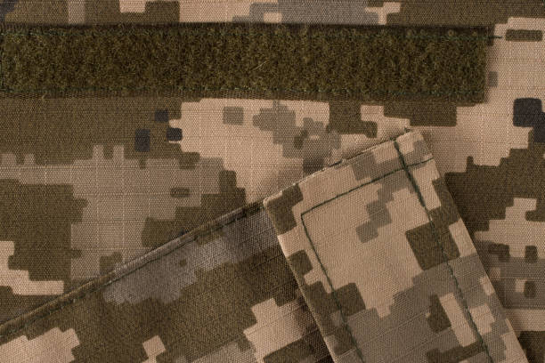 istock Universal camouflage pattern army combat uniform digital camo. Top view. 1077971958