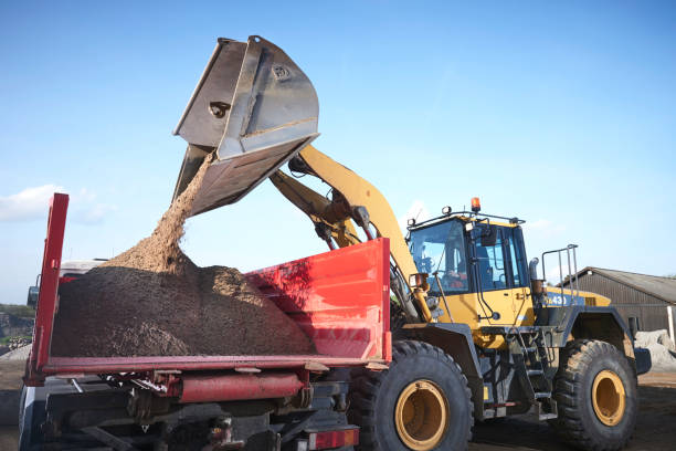 istock Excavator moving sand in a gravel pit 1077974990