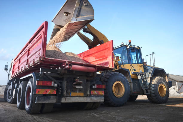 istock Excavator moving sand in a gravel pit 1077975010