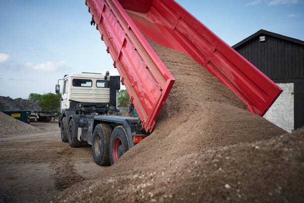 istock Excavator moving sand in a gravel pit 1077975446