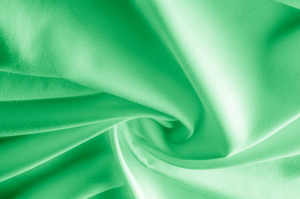 istock texture. silk fabric is green. Incredibly soft and thin, do not miss this chiffon chiffon. With flowers that gently fade from one to the next in combination, create a stunning design 1077978064