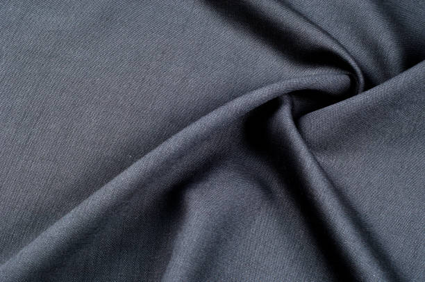 Background texture, pattern. cloth wool suit gray. A genuine flannel is always made of carded yarn, carded flannel is ideal in the cold months of the year, it is heavy, cozy and soft.