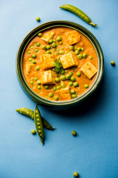istock Green peas or matar paneer curry recipe, served in a bowl. selective focus 1077978302