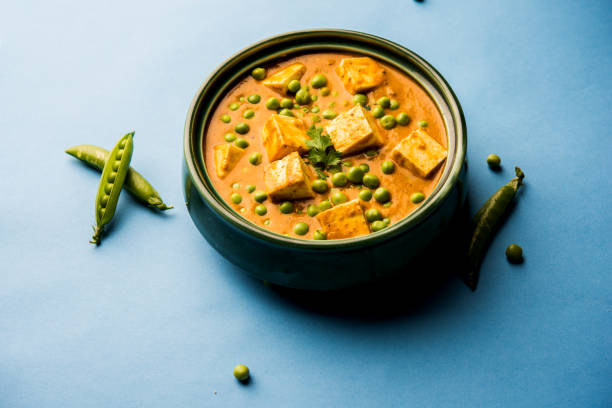 istock Green peas or matar paneer curry recipe, served in a bowl. selective focus 1077978390