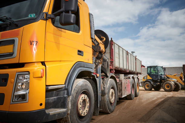 istock Excavator moving sand in a gravel pit 1077978482