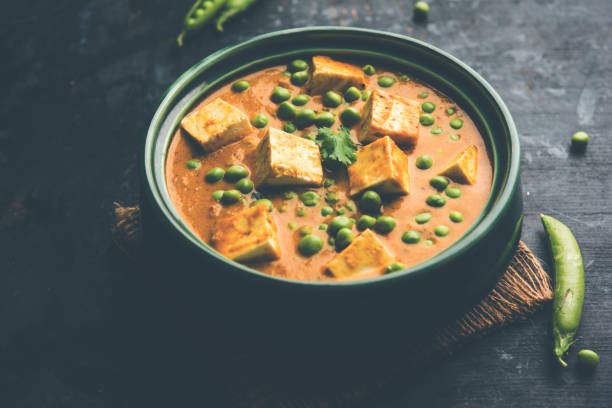 istock Green peas or matar paneer curry recipe, served in a bowl. selective focus 1077979108