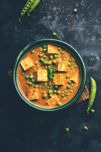 istock Green peas or matar paneer curry recipe, served in a bowl. selective focus 1077979132