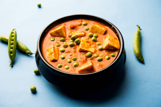 istock Green peas or matar paneer curry recipe, served in a bowl. selective focus 1077980526