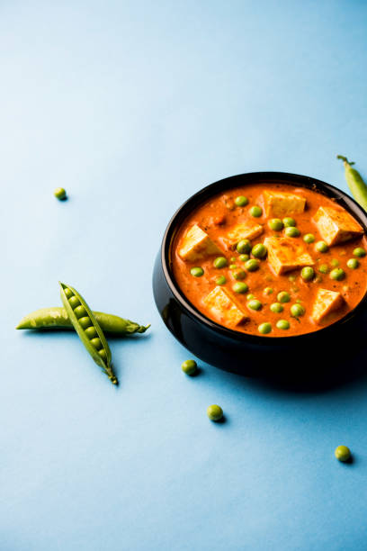 istock Green peas or matar paneer curry recipe, served in a bowl. selective focus 1077980564