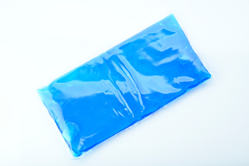 Salud: Vista superior del paquete de hielo azul aislado sobre fondo blanco photo