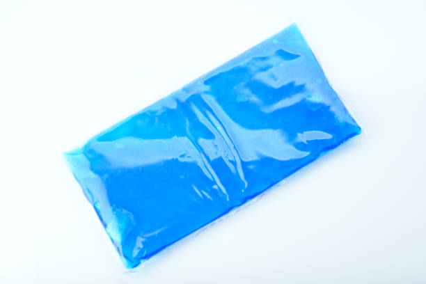 health: top view of blue ice pack isolated on white background - ice pack fotos imagens e fotografias de stock