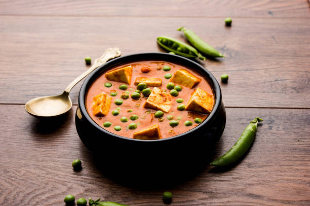 istock Green peas or matar paneer curry recipe, served in a bowl. selective focus 1077980702