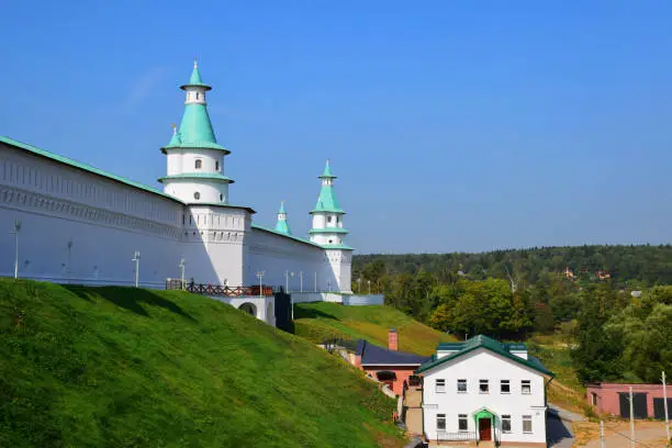 The fortress wall and eight towers of the New Jerusalem Monastery were built under the guidance of architect Yakov Bukhvostov in 1690. Russia, Istra, September 2018