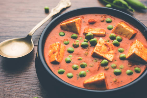 istock Green peas or matar paneer curry recipe, served in a bowl. selective focus 1077980884