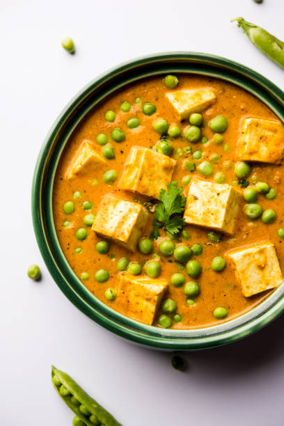 istock Green peas or matar paneer curry recipe, served in a bowl. selective focus 1077981090