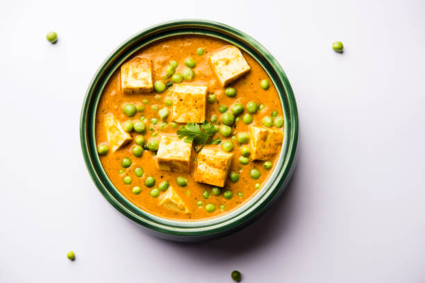 istock Green peas or matar paneer curry recipe, served in a bowl. selective focus 1077982056