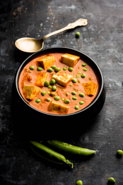 istock Green peas or matar paneer curry recipe, served in a bowl. selective focus 1077982196