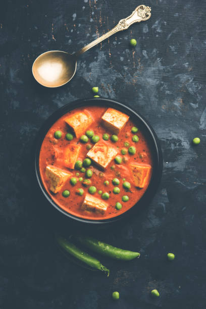 istock Green peas or matar paneer curry recipe, served in a bowl. selective focus 1077982380
