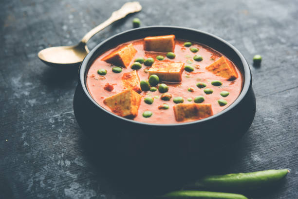 istock Green peas or matar paneer curry recipe, served in a bowl. selective focus 1077982422