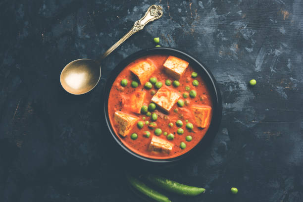 istock Green peas or matar paneer curry recipe, served in a bowl. selective focus 1077982564