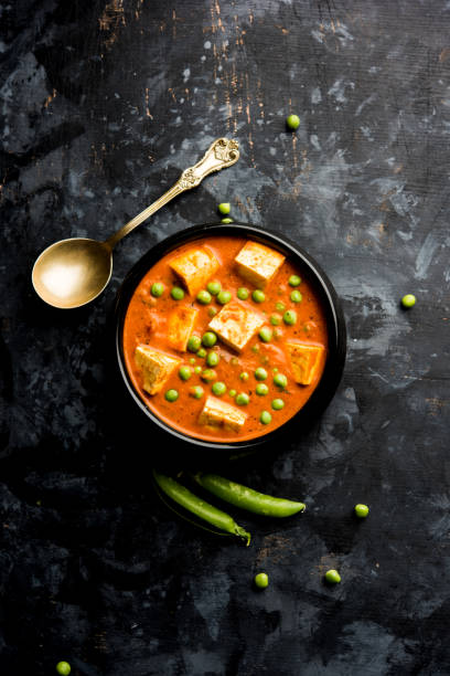 istock Green peas or matar paneer curry recipe, served in a bowl. selective focus 1077983696