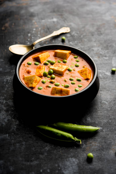 istock Green peas or matar paneer curry recipe, served in a bowl. selective focus 1077983722