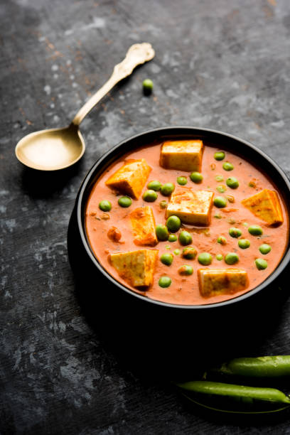 istock Green peas or matar paneer curry recipe, served in a bowl. selective focus 1077984822