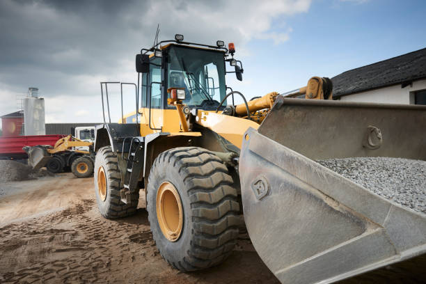 istock Excavator moving sand in a gravel pit 1077984926