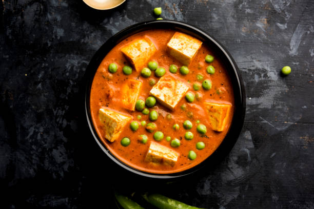 istock Green peas or matar paneer curry recipe, served in a bowl. selective focus 1077984936