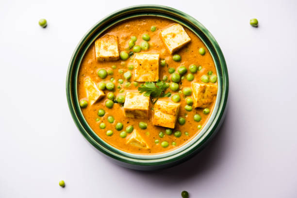 istock Green peas or matar paneer curry recipe, served in a bowl. selective focus 1077985148