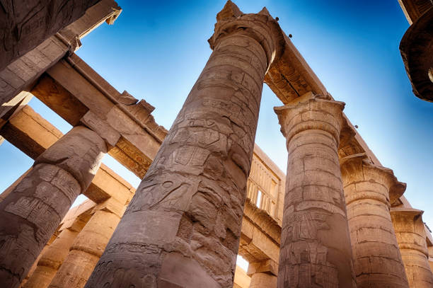 istock Great Hypostyle Hall and clouds at the Temples of Karnak 1077985230