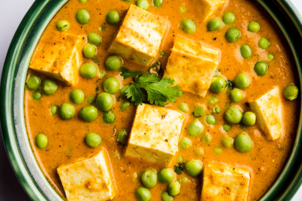istock Green peas or matar paneer curry recipe, served in a bowl. selective focus 1077985338