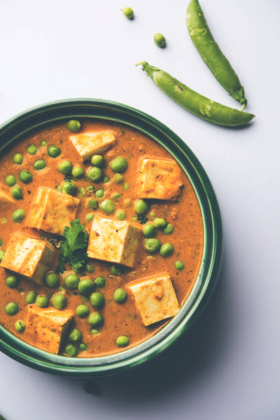istock Green peas or matar paneer curry recipe, served in a bowl. selective focus 1077985418