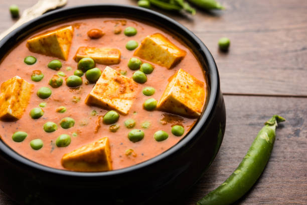 istock Green peas or matar paneer curry recipe, served in a bowl. selective focus 1077985832