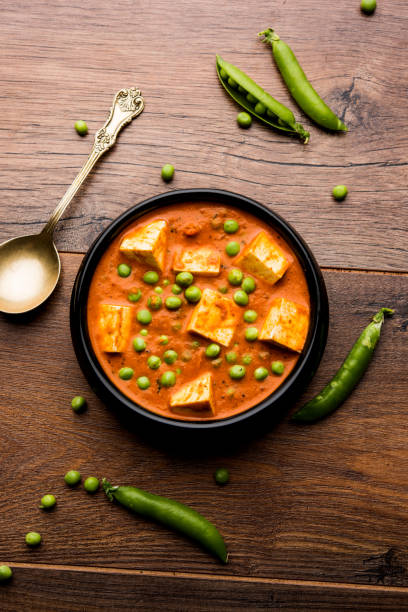 istock Green peas or matar paneer curry recipe, served in a bowl. selective focus 1077985896