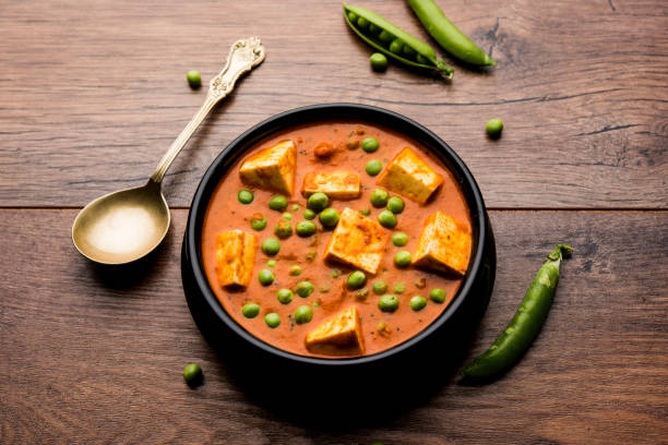 istock Green peas or matar paneer curry recipe, served in a bowl. selective focus 1077985964
