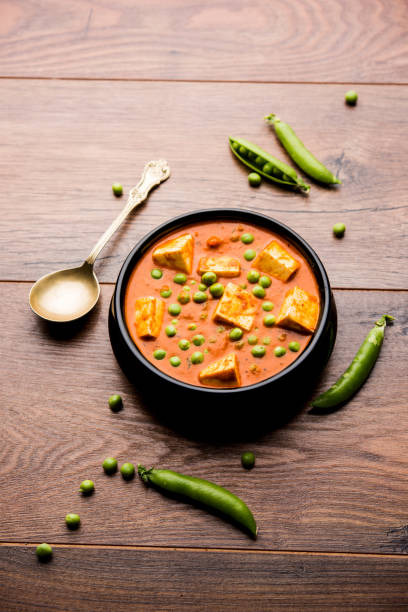 istock Green peas or matar paneer curry recipe, served in a bowl. selective focus 1077986020