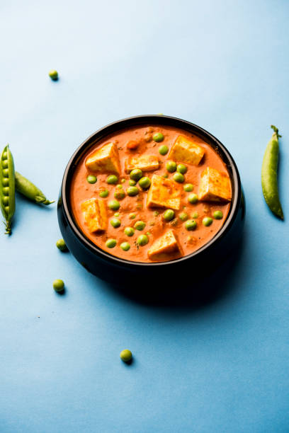 istock Green peas or matar paneer curry recipe, served in a bowl. selective focus 1077986180