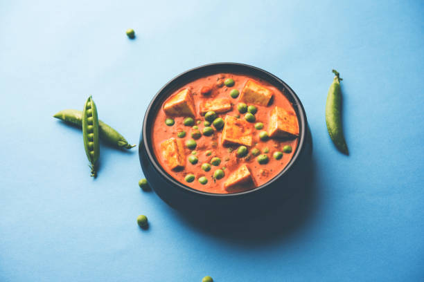 istock Green peas or matar paneer curry recipe, served in a bowl. selective focus 1077986278