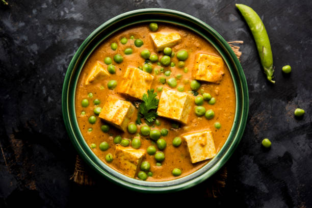 istock Green peas or matar paneer curry recipe, served in a bowl. selective focus 1077986358
