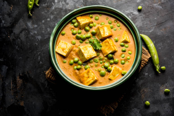 istock Green peas or matar paneer curry recipe, served in a bowl. selective focus 1077987702